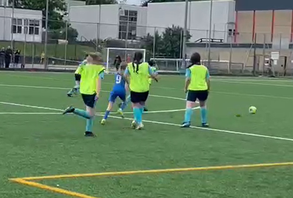 Photo of girls playing football